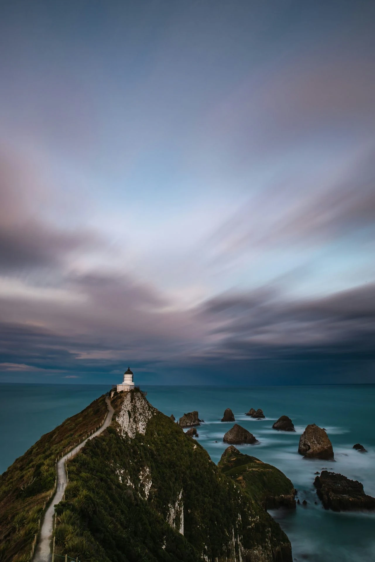 Nugget Point lighthouse on a Catlins one-way toward Invercargill